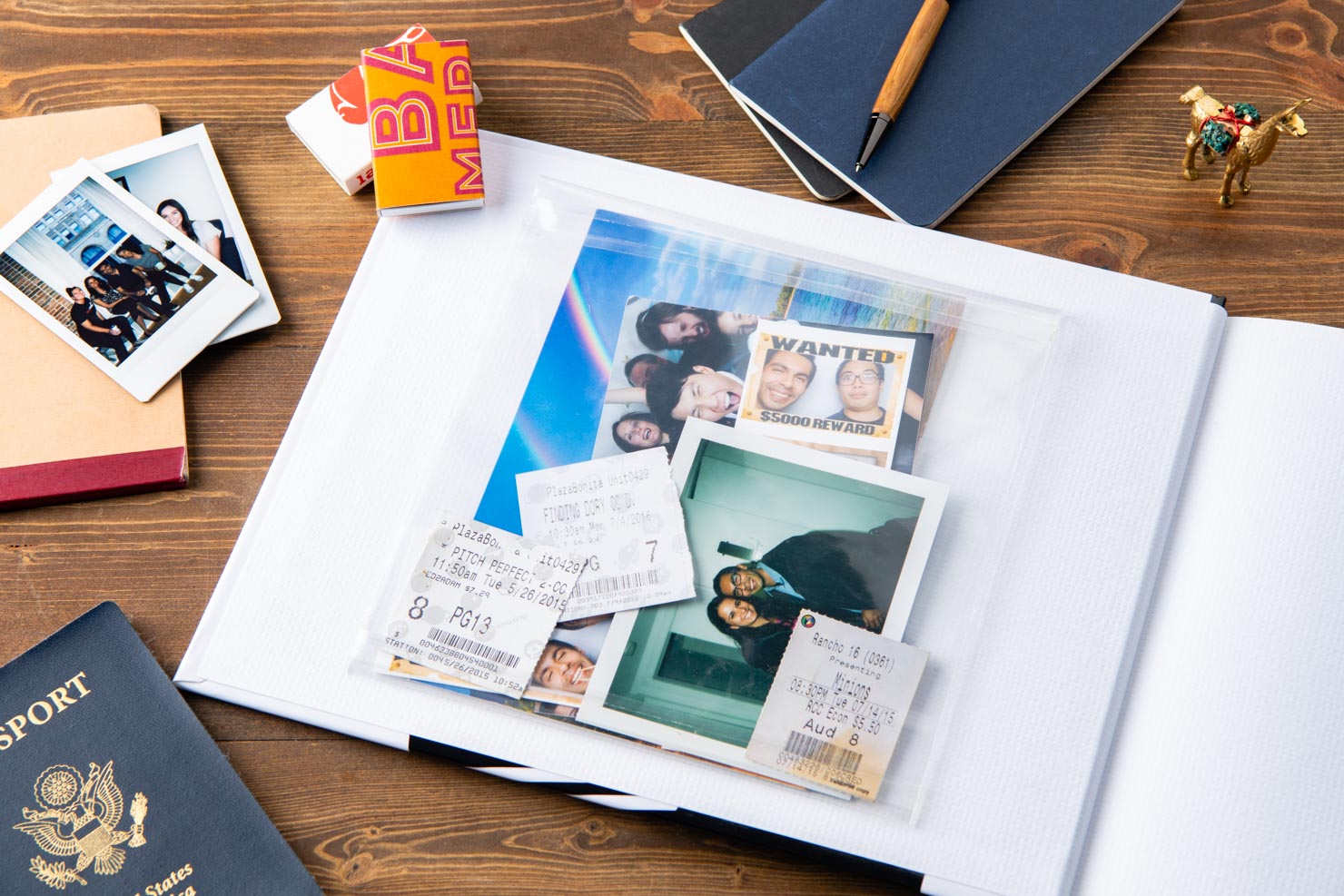 photo book with memorabilia pocket holding ticket stubs and loose photos