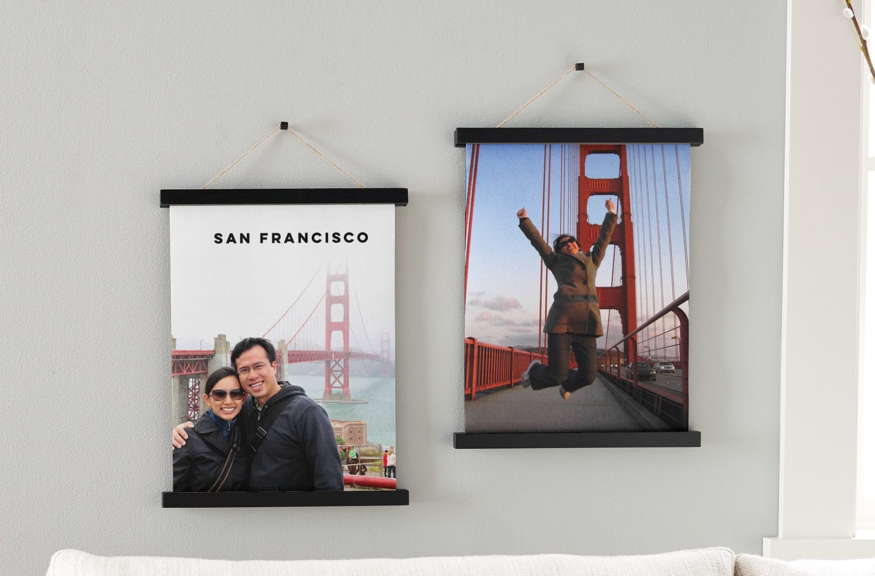 Custom hanging canvas prints on a wall