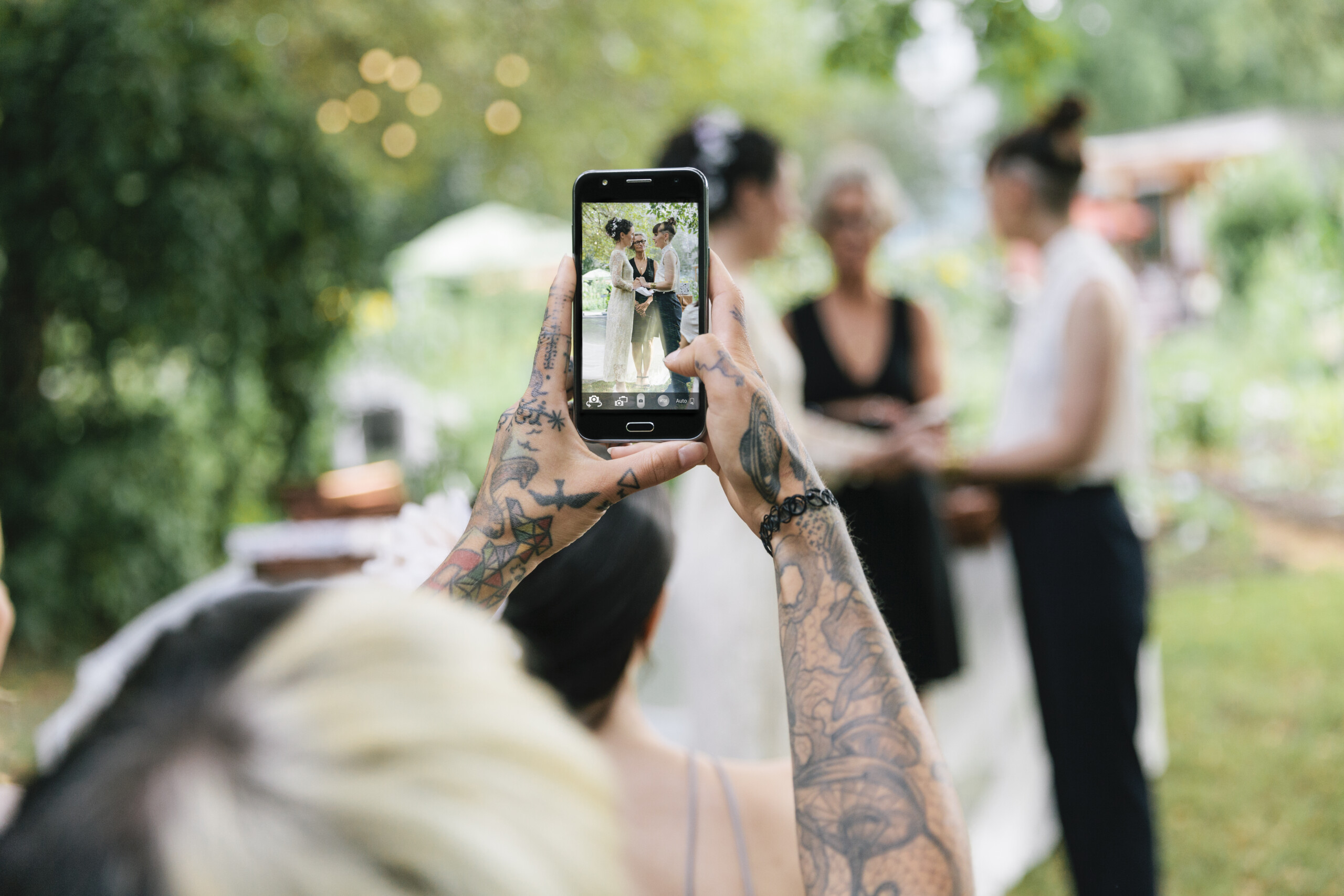 Woman taking photo at Wedding