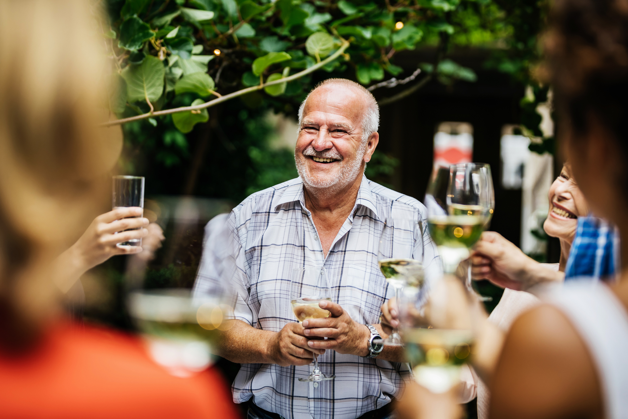 man being celebrated with a toast at retirement party