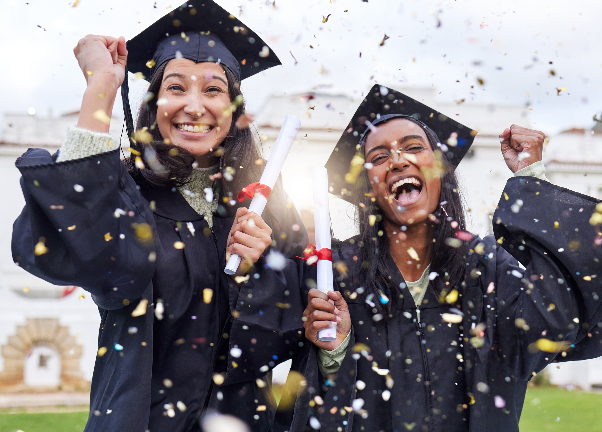young women celebrating graduation