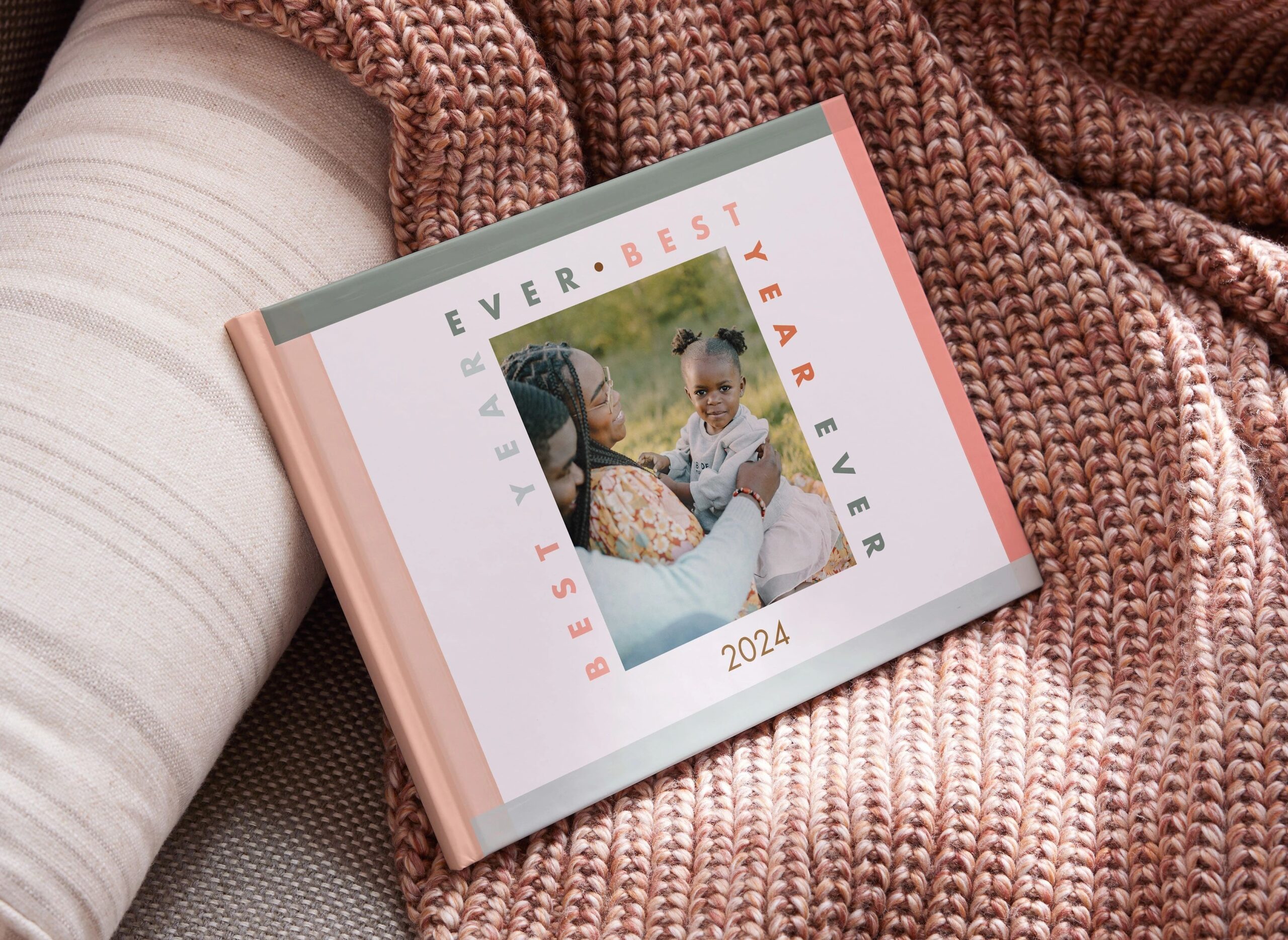 photo book with picture of parents and child on cover