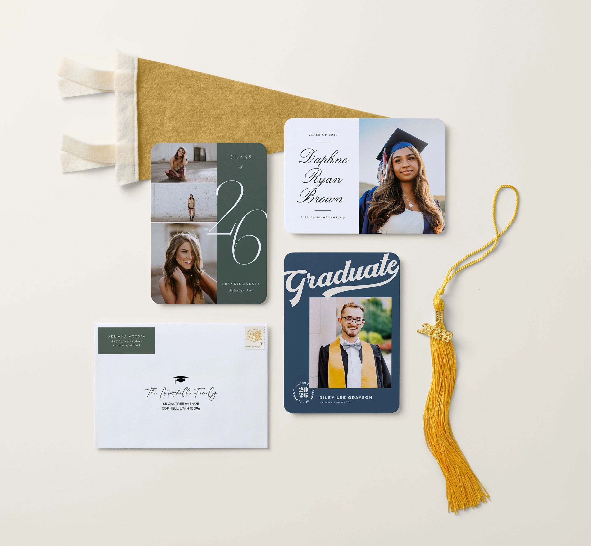 three photo graduation announcements and an addressed envelope