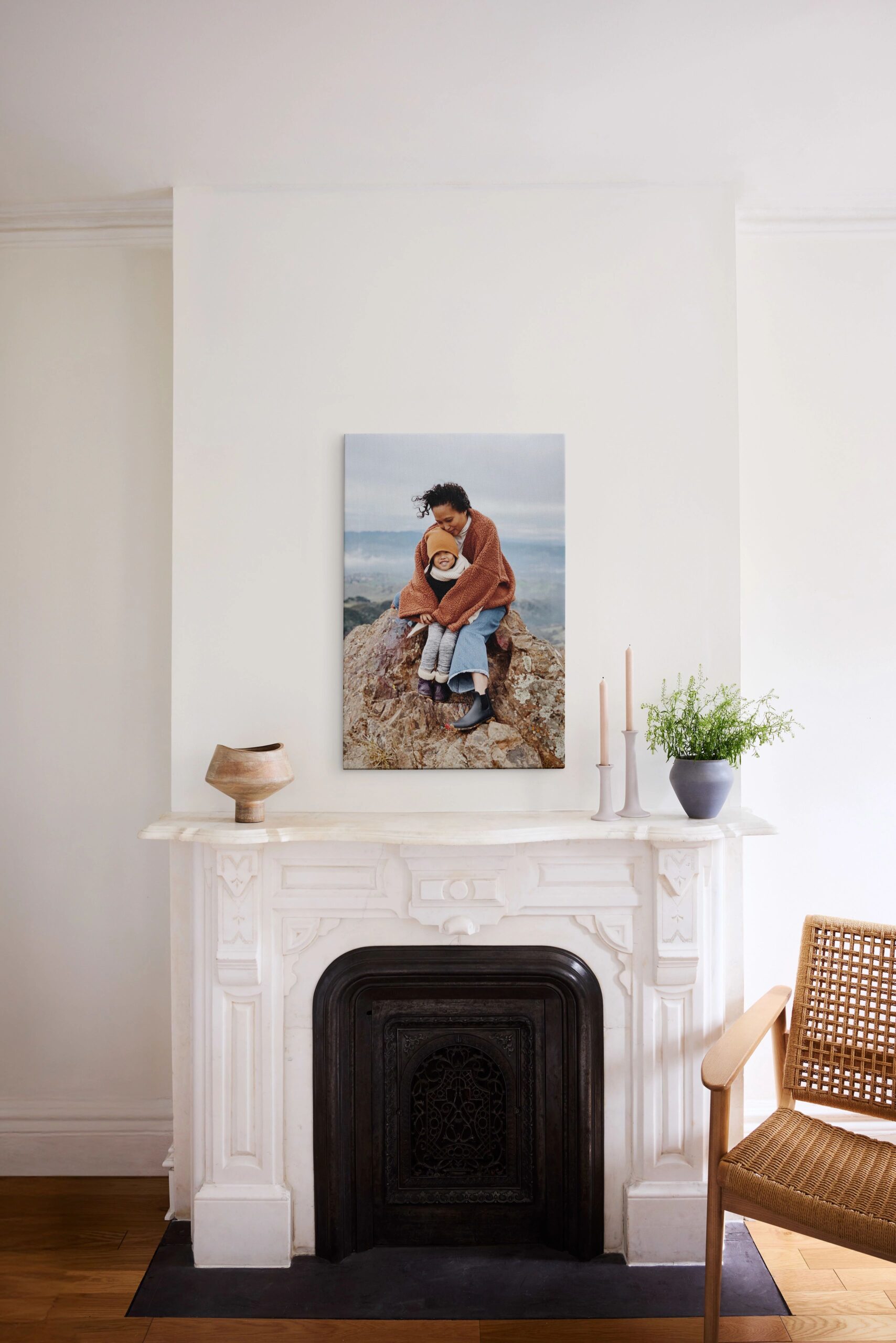 unframed canvas print hanging on wall