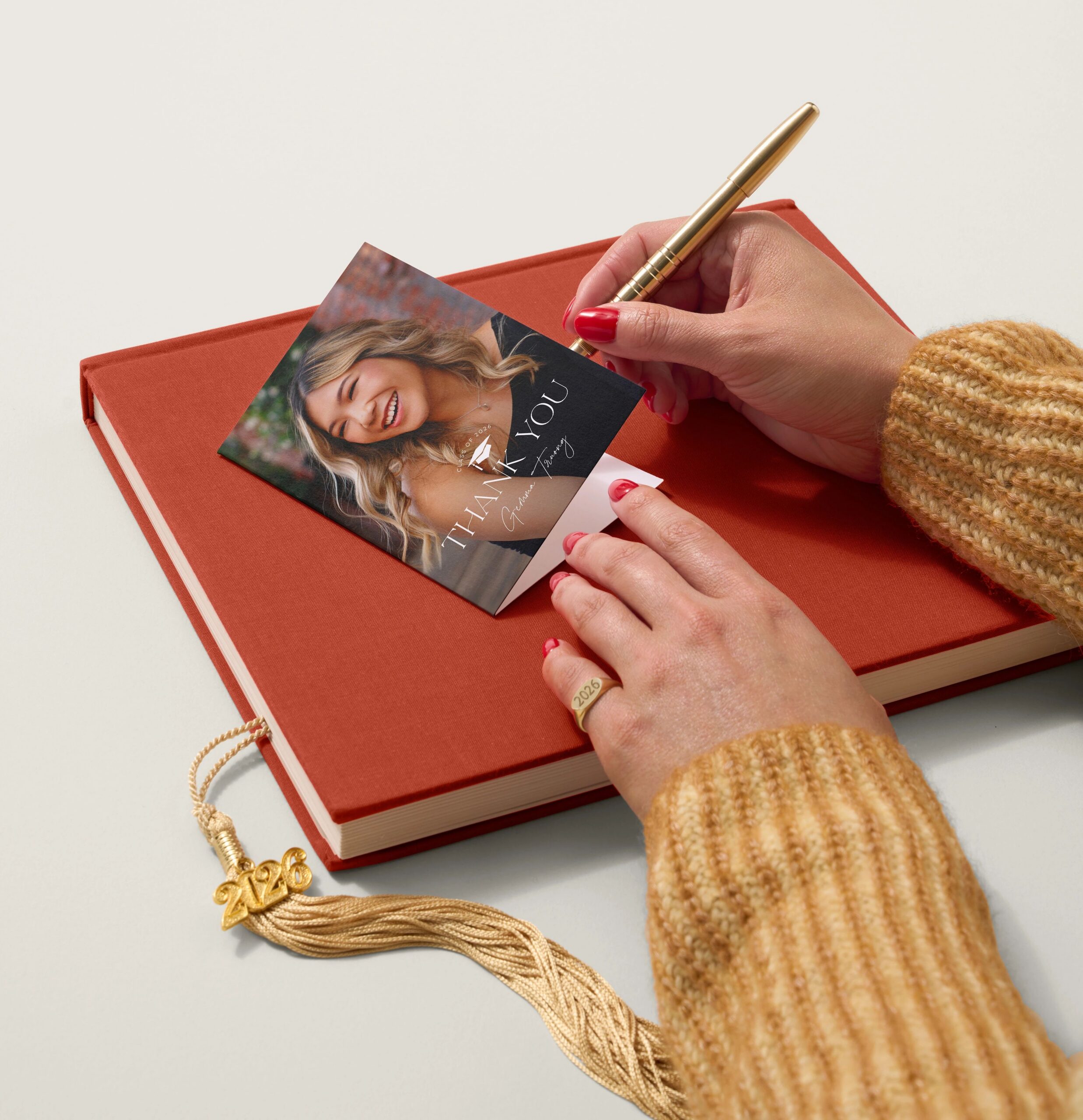 writing in a graduation thank you card