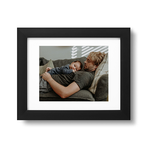 framed print with picture of dad and baby